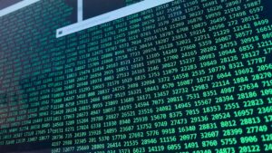 Vibrant green numbers on a computer screen, showcasing binary code and data streams.